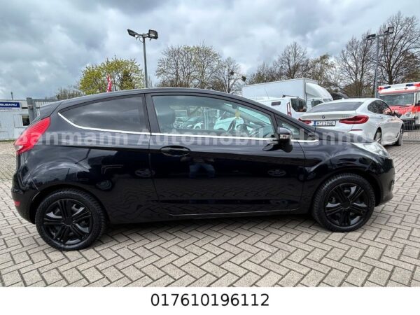 <span class="make">Ford</span><br/> Fiesta Titanium – Bild 11